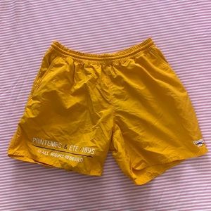 Reebok Classic mustard shorts in Medium.